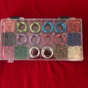 Necklace/bracelet making kit. Never used. Hinge came broken.